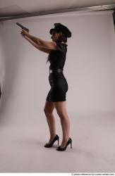 NIKITA STANDING POSE WITH GUN